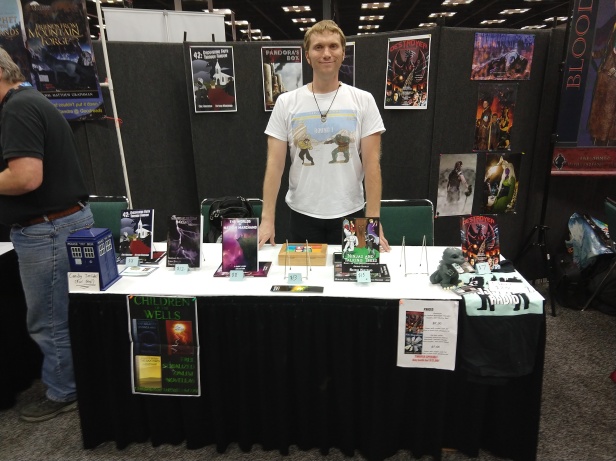 Nathan Marchand sells his books at Gen Con
